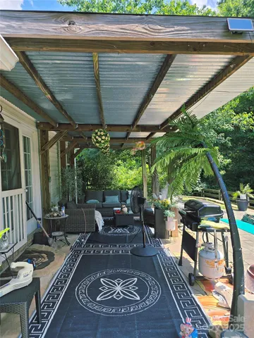 a view of an outdoor sitting area with couch