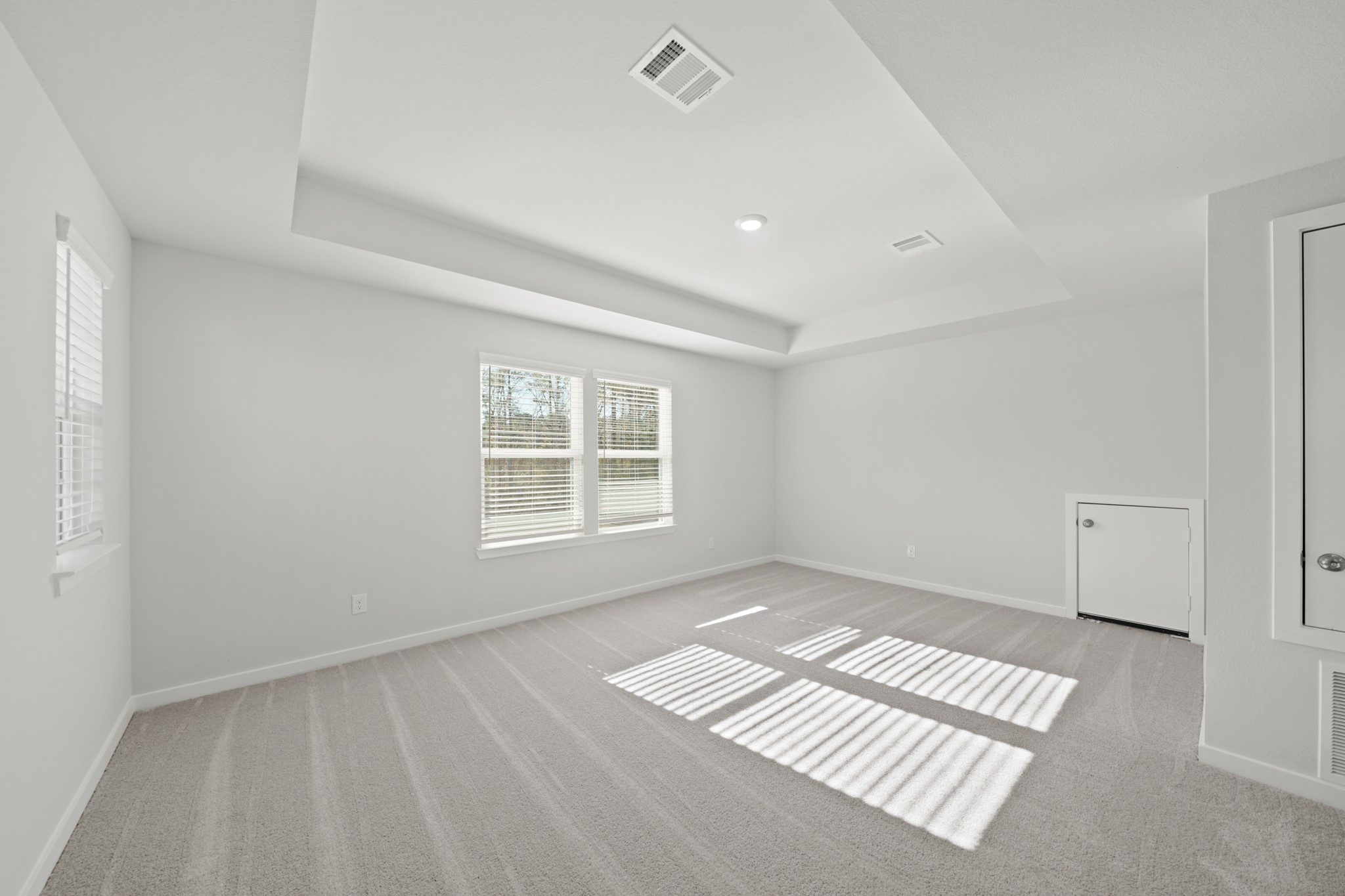 9798 Caney Bend Road Conroe, TX 77303 - Photo 19 of 27 a view of an empty room and a window
