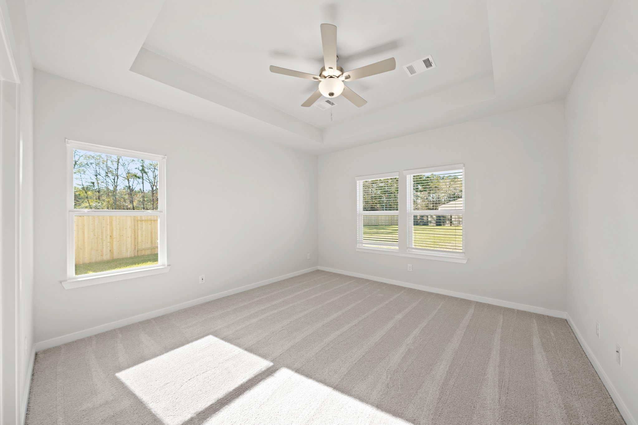 9798 Caney Bend Road Conroe, TX 77303 - Photo 9 of 27 a view of an empty room with a window