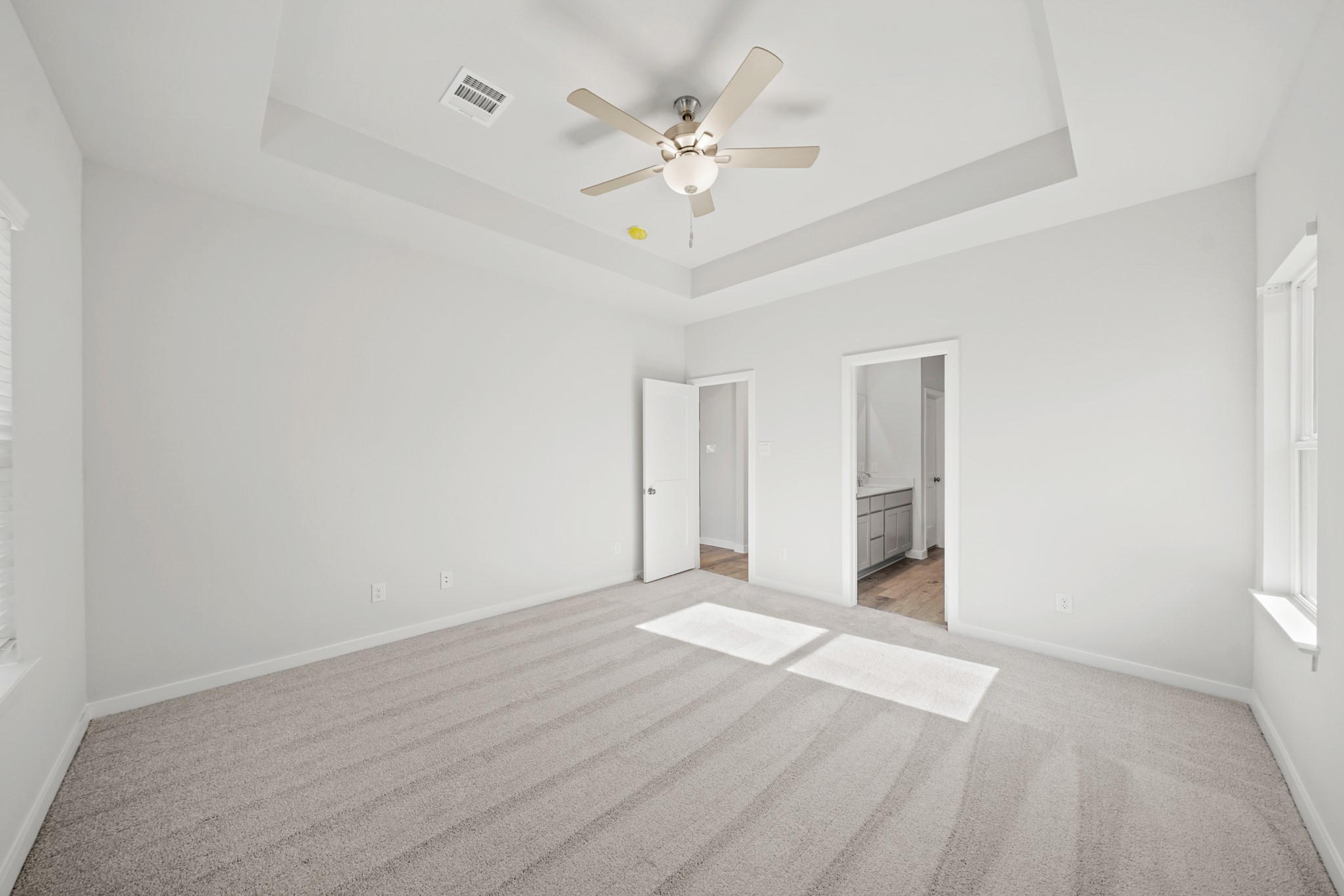 9798 Caney Bend Road Conroe, TX 77303 - Photo 10 of 27 an empty room with fan and a ceiling fan