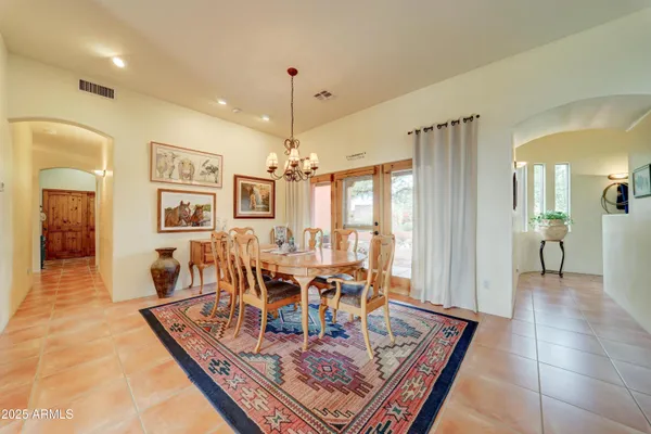 a view of a dining room with furniture