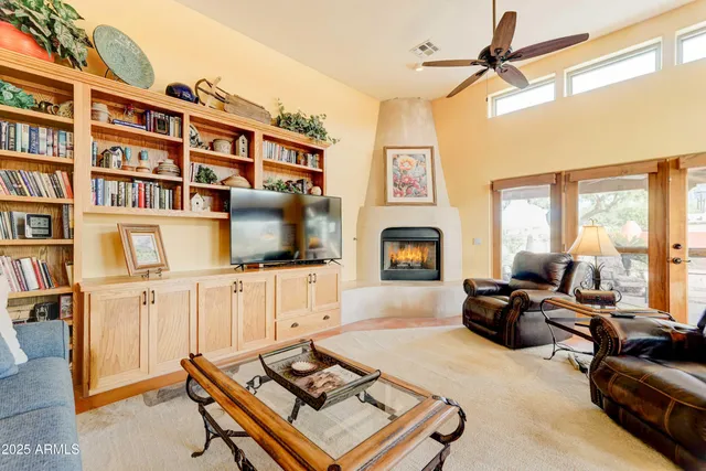 a kitchen with stainless steel appliances granite countertop a refrigerator sink and microwave