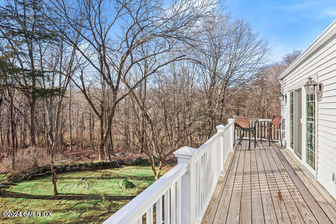 320 Cognewaugh Road Cos Cob, CT 06807 - Photo 13 of 15 a view of balcony with wooden floor and fence