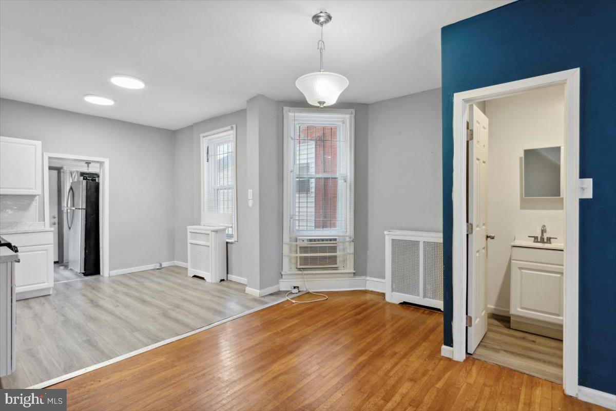 1658 North Redfield Street Philadelphia, PA 19151 - Photo 8 of 23 Dining Room, Kitchen & Half Bath