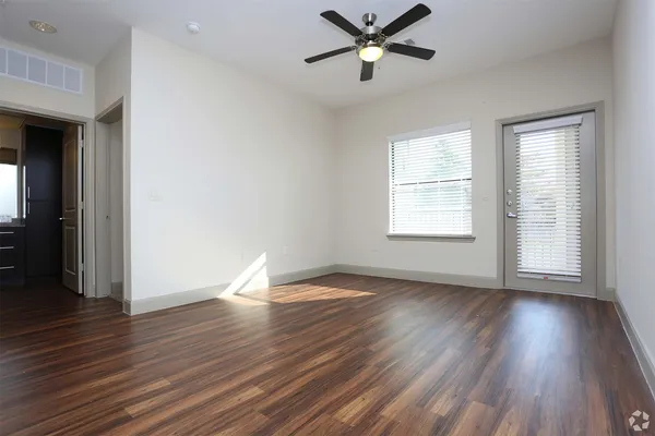 a view of a kitchen from the hallway