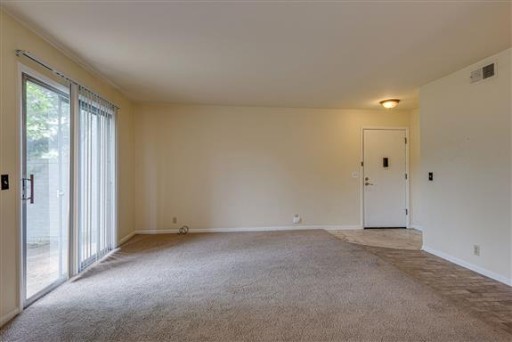 1900 Richard Jones Road, Unit V2 Nashville, TN 37215 - Photo 9 of 23 a view of an empty room with a window
