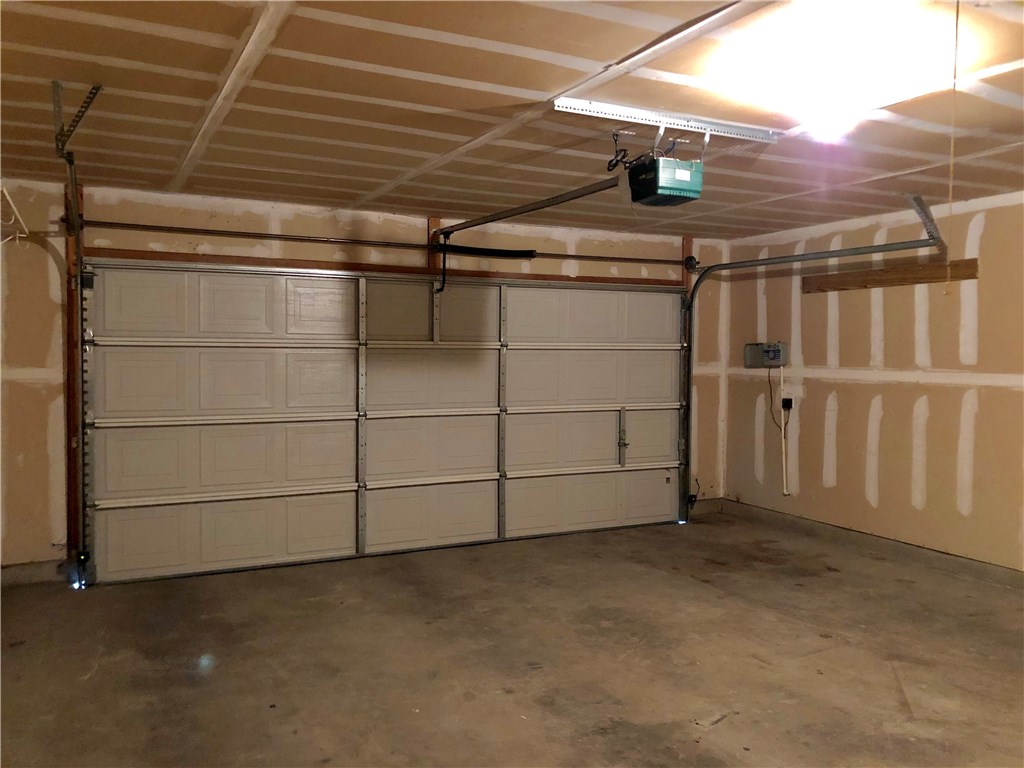 1780 Stone Rim Loop Buda, TX 78610 - Photo 17 of 19 a view of a garage