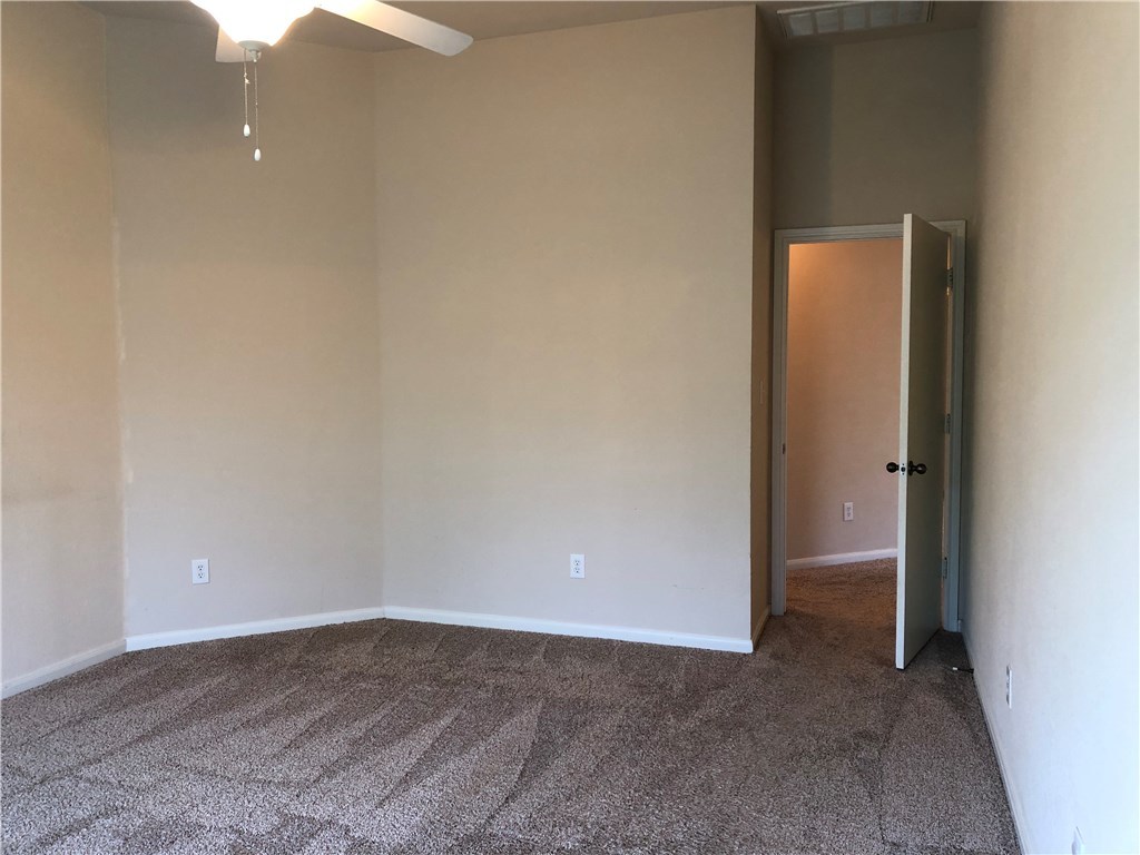 1780 Stone Rim Loop Buda, TX 78610 - Photo 9 of 19 a view of an empty room