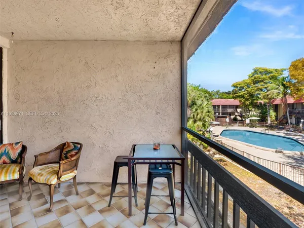 a bedroom with a bed and a desk