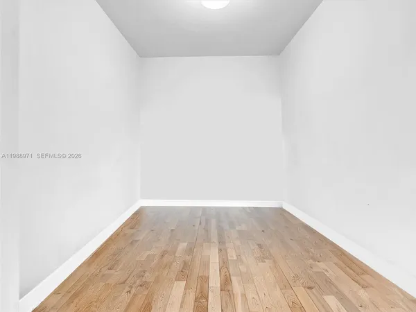 a view of a room with racks on the wall