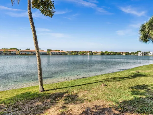 a view of entryway with flower plants