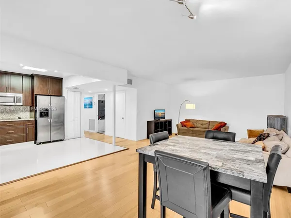 a view of a balcony with furniture and outside view