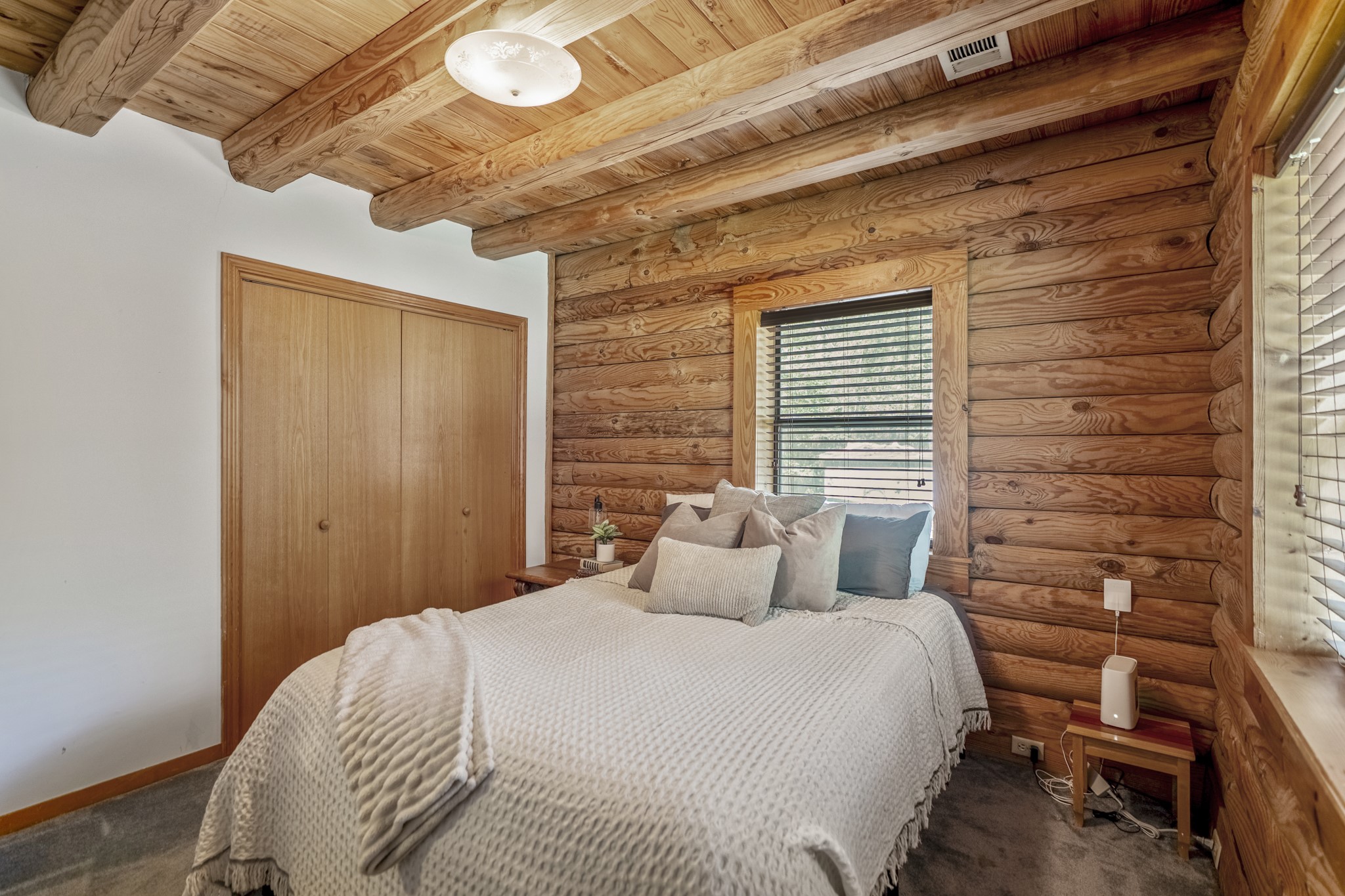 31370 Lazy Ridge Drive Waller, TX 77484 - Photo 20 of 43 Bedroom two with closet and the same log cabin feeling.