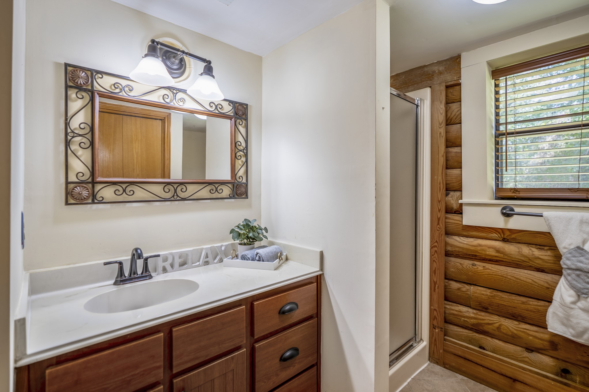 31370 Lazy Ridge Drive Waller, TX 77484 - Photo 22 of 43 Single sink and shower in the downstairs bathroom.