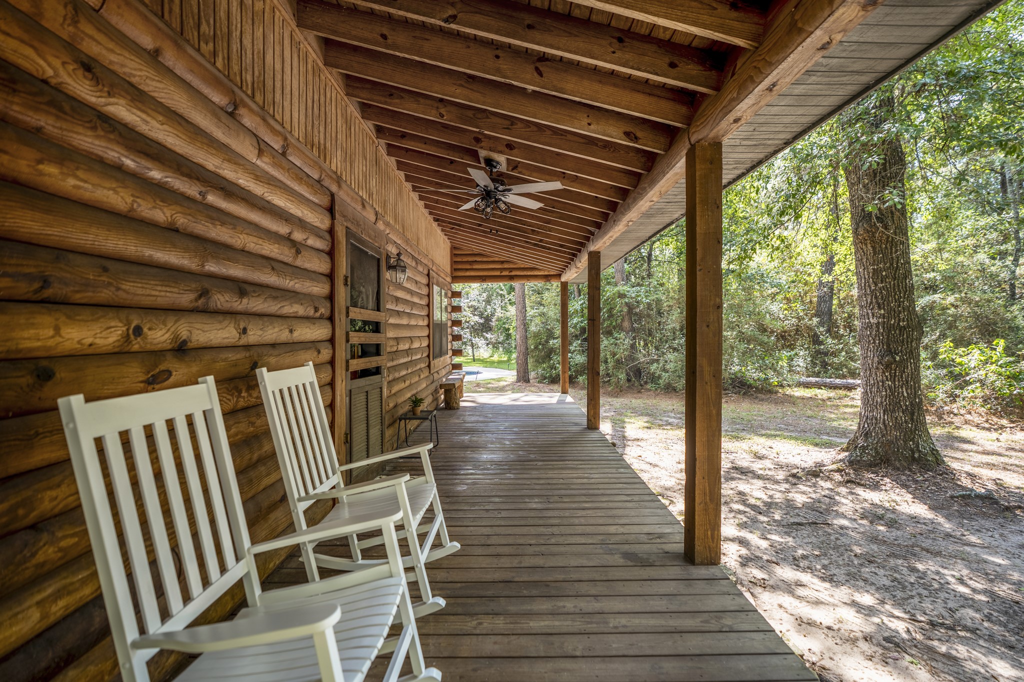 31370 Lazy Ridge Drive Waller, TX 77484 - Photo 8 of 43 Fan on the porch will help you enjoy even in this Texas heat.