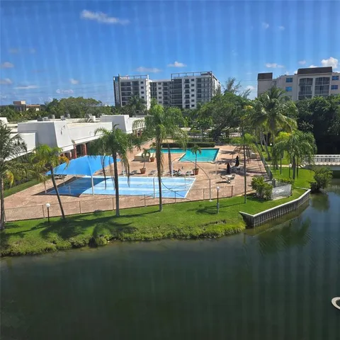 a view of a lake with a building in front of it