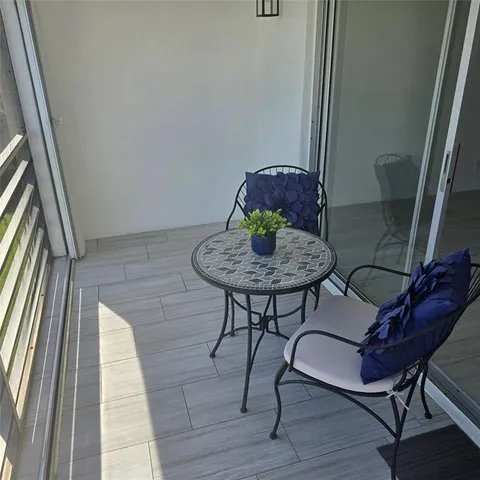 a room with furniture and rug