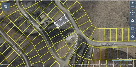 a bathroom with a sink and glass door