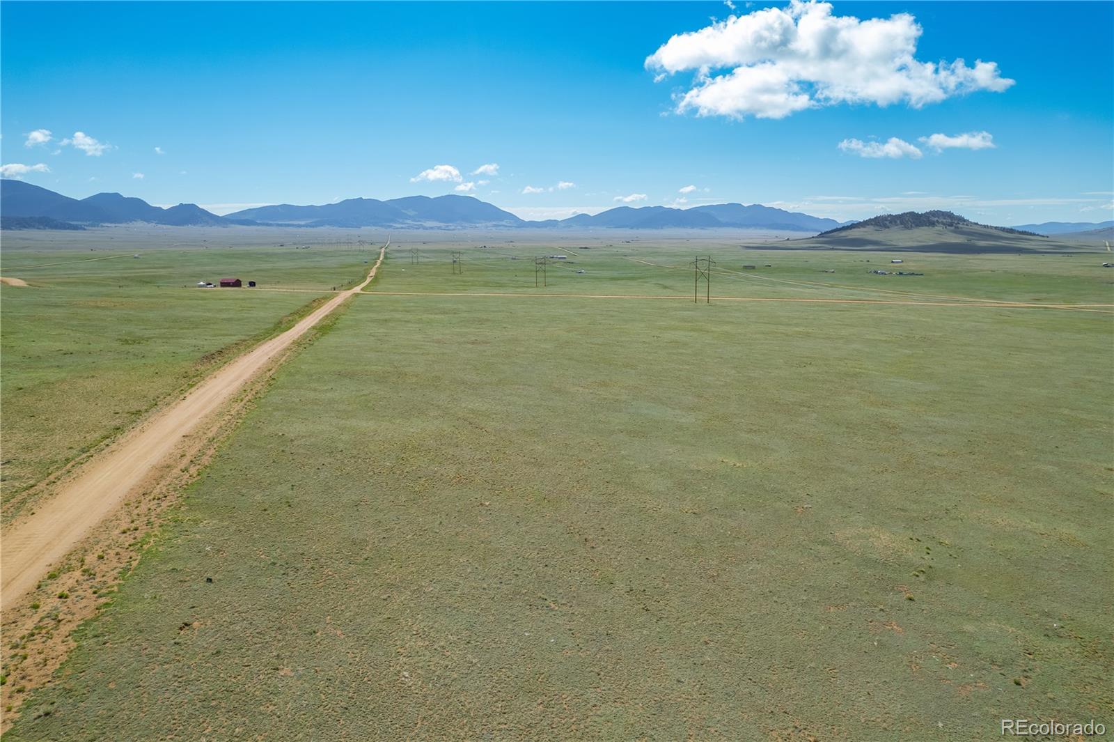 5868 Jackson Road Hartsel, CO 80449 - Photo 20 of 24 a view of a lake with a mountain