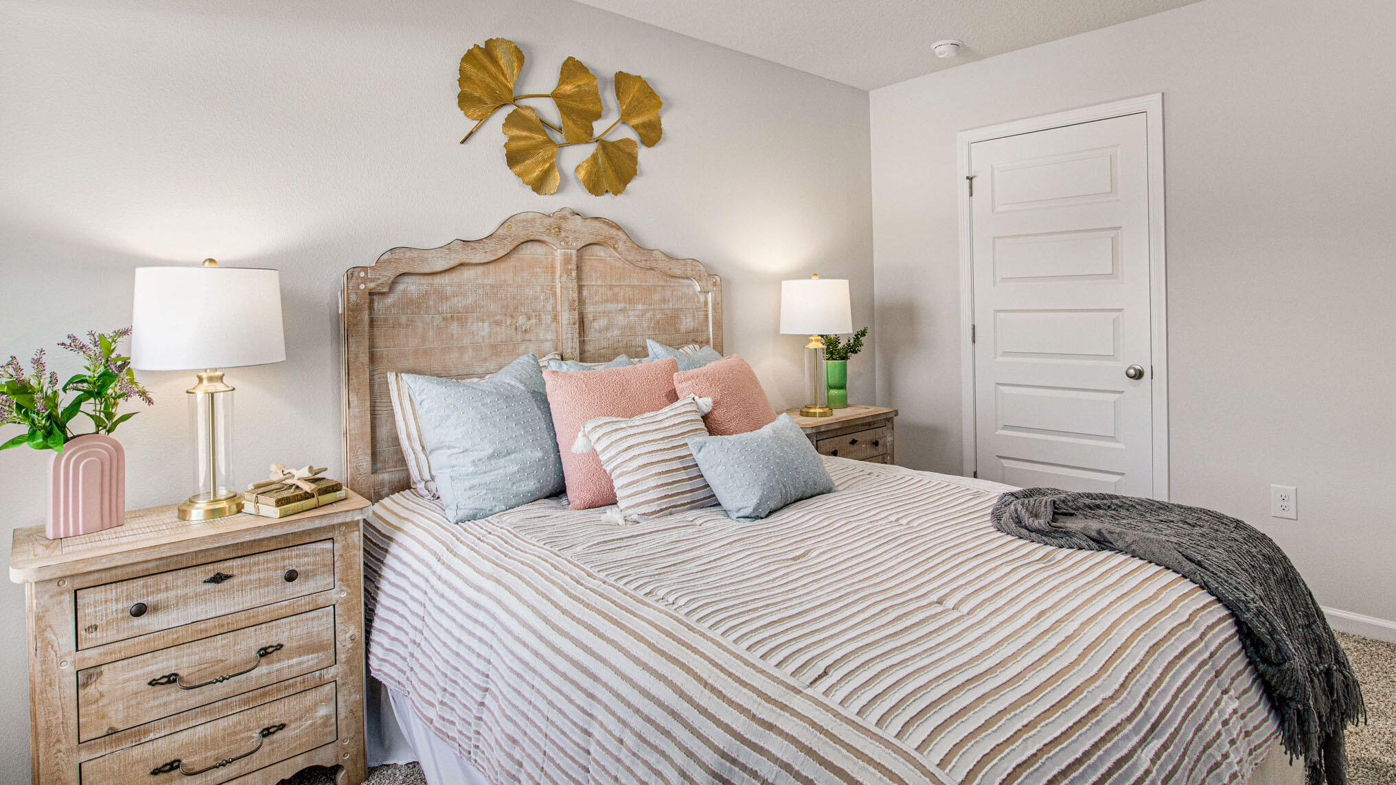 6424 Firefly Drive Milton, FL 32583 - Photo 18 of 33 a bedroom with a bed and a potted plant