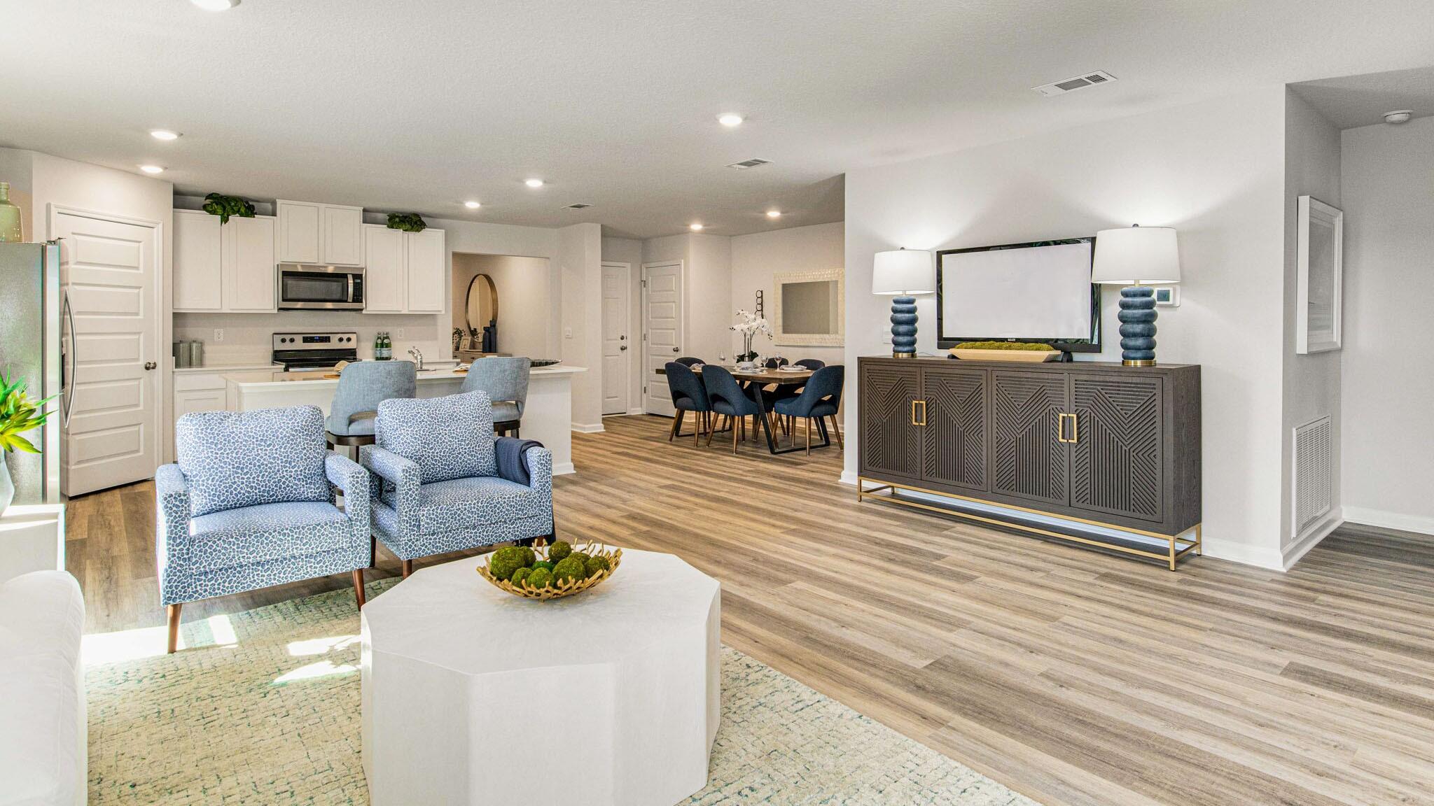 6424 Firefly Drive Milton, FL 32583 - Photo 6 of 33 a living room with furniture a large window with kitchen view