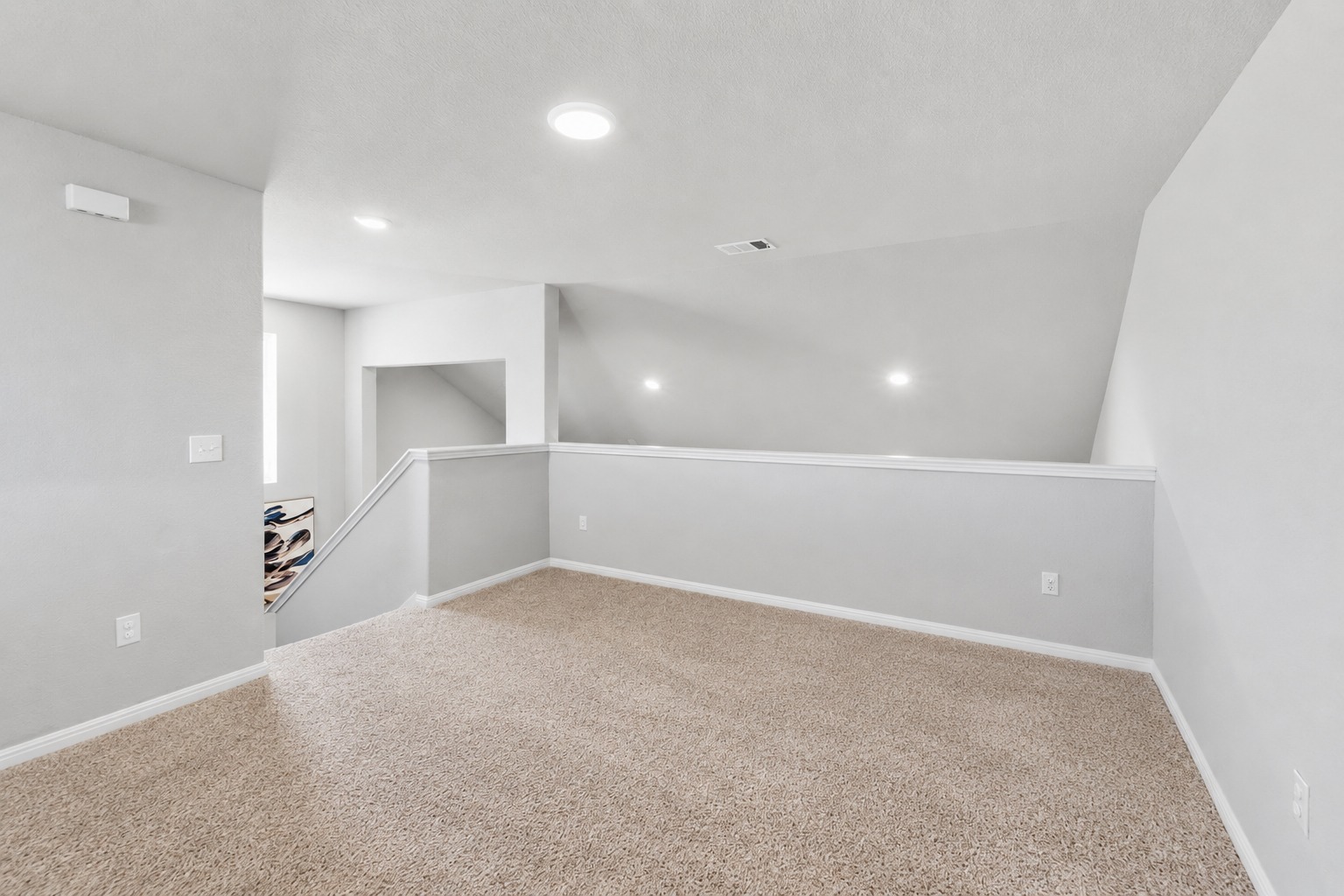 142 Brunnen Way Georgetown, TX 78626 - Photo 15 of 22 A versatile upstairs loft with plush carpeting provides an ideal flex space.