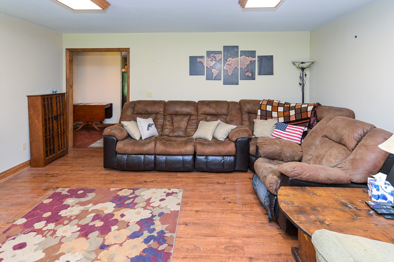 144 North Howard Fitch Road Kelso, TN 37348 - Photo 19 of 59 a living room with furniture and wooden floor