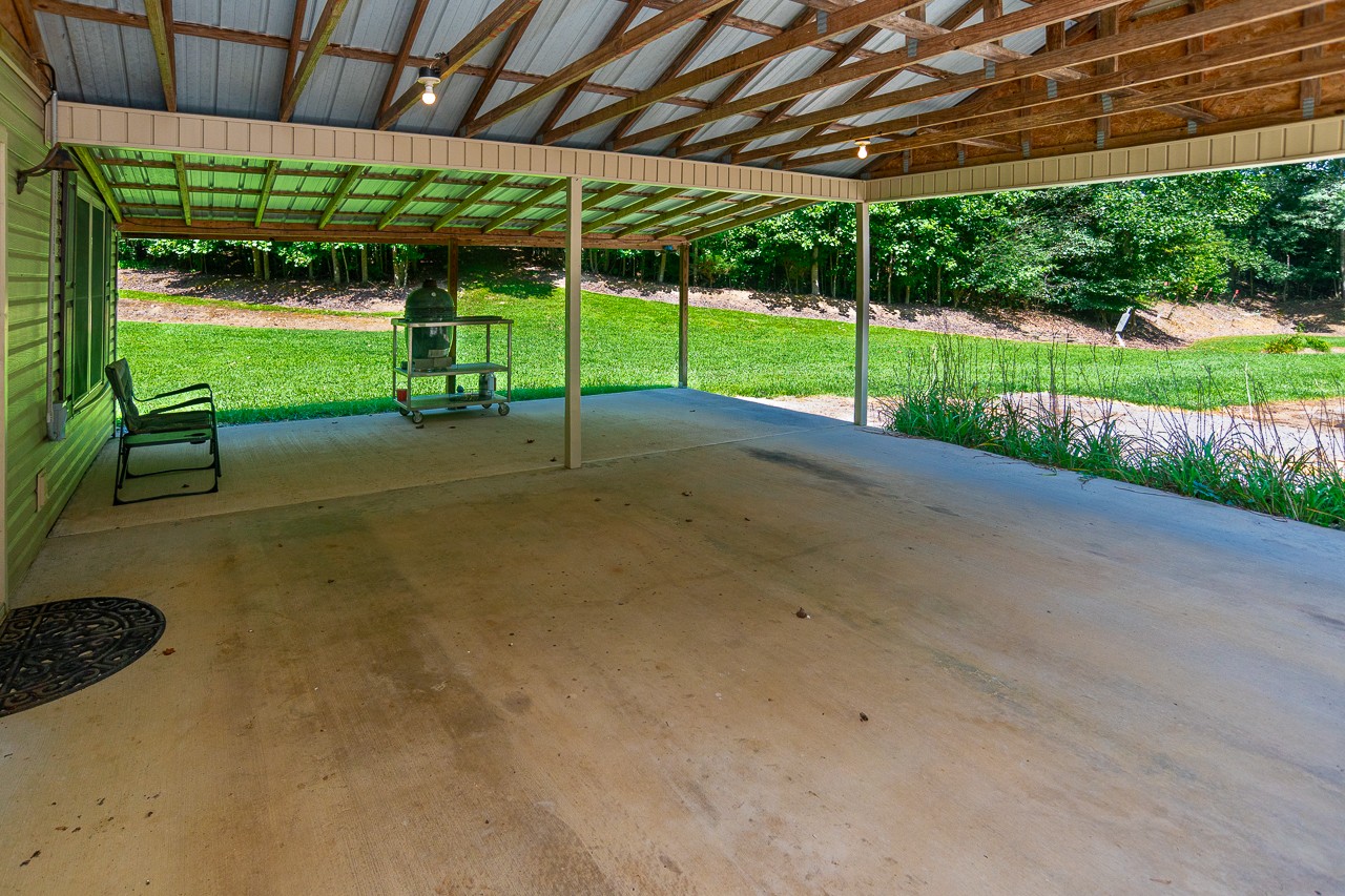 144 North Howard Fitch Road Kelso, TN 37348 - Photo 8 of 59 a view of a house with backyard and porch