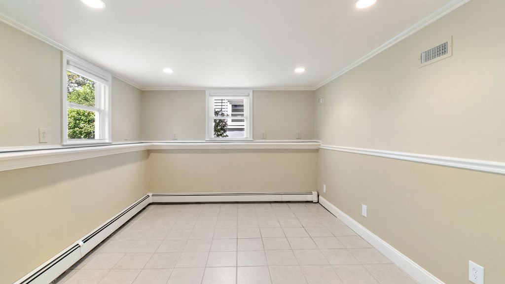 53 Cedarcrest Road Boston, MA 02132 - Photo 20 of 29 an empty room with windows