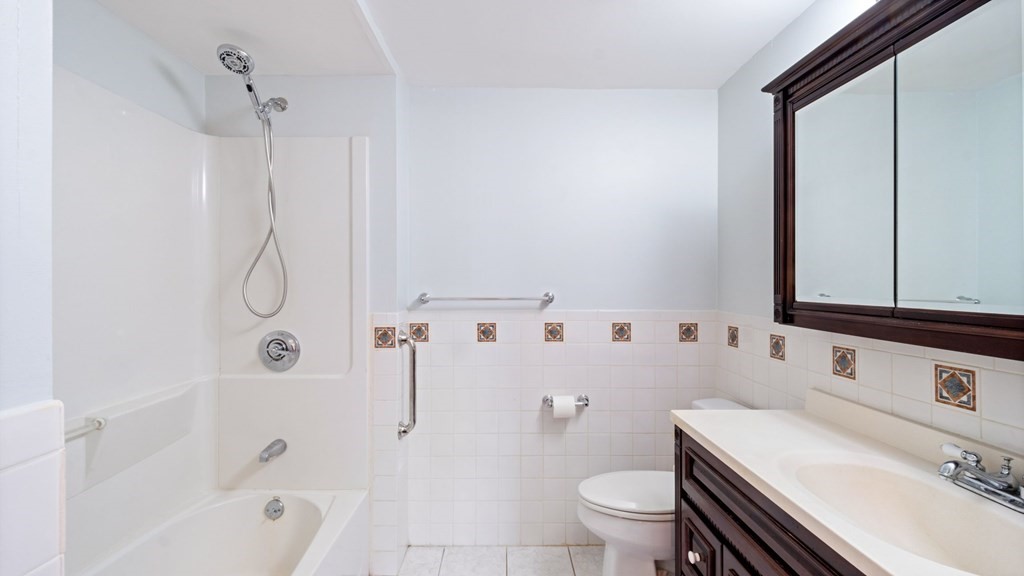 53 Cedarcrest Road Boston, MA 02132 - Photo 22 of 29 a bathroom with a sink a toilet and shower
