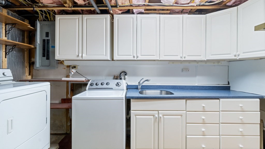 53 Cedarcrest Road Boston, MA 02132 - Photo 24 of 29 a utility room with dryer and washer