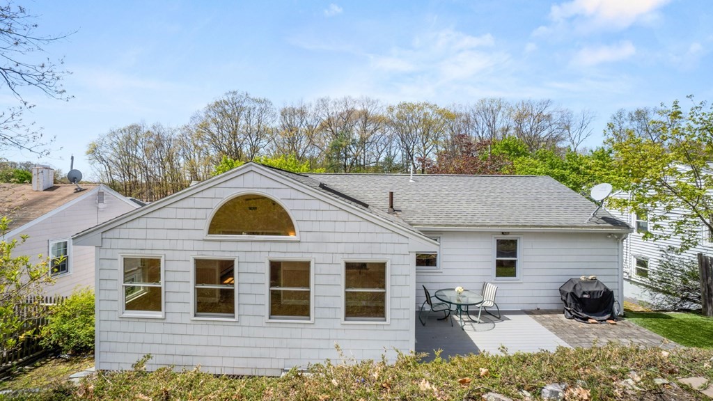53 Cedarcrest Road Boston, MA 02132 - Photo 25 of 29 a aerial view of a house with a yard and sitting area