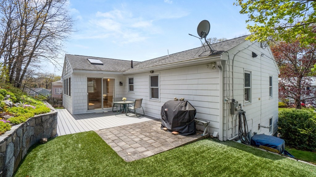 53 Cedarcrest Road Boston, MA 02132 - Photo 26 of 29 a view of house with patio outdoor seating