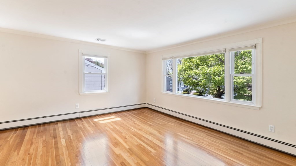 53 Cedarcrest Road Boston, MA 02132 - Photo 4 of 29 a view of an empty room with a window