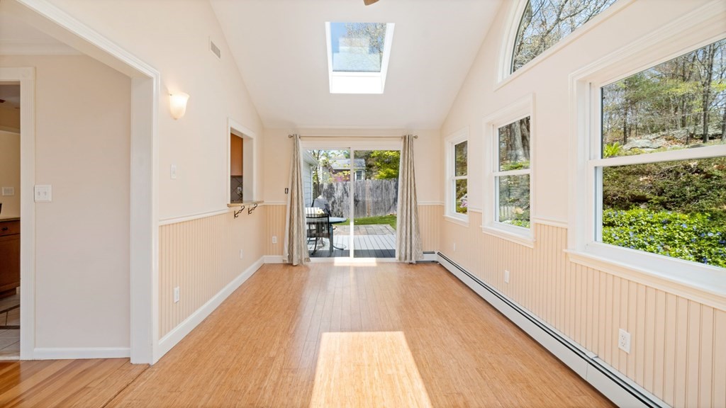 53 Cedarcrest Road Boston, MA 02132 - Photo 9 of 29 a view of a room with wooden floor and windows