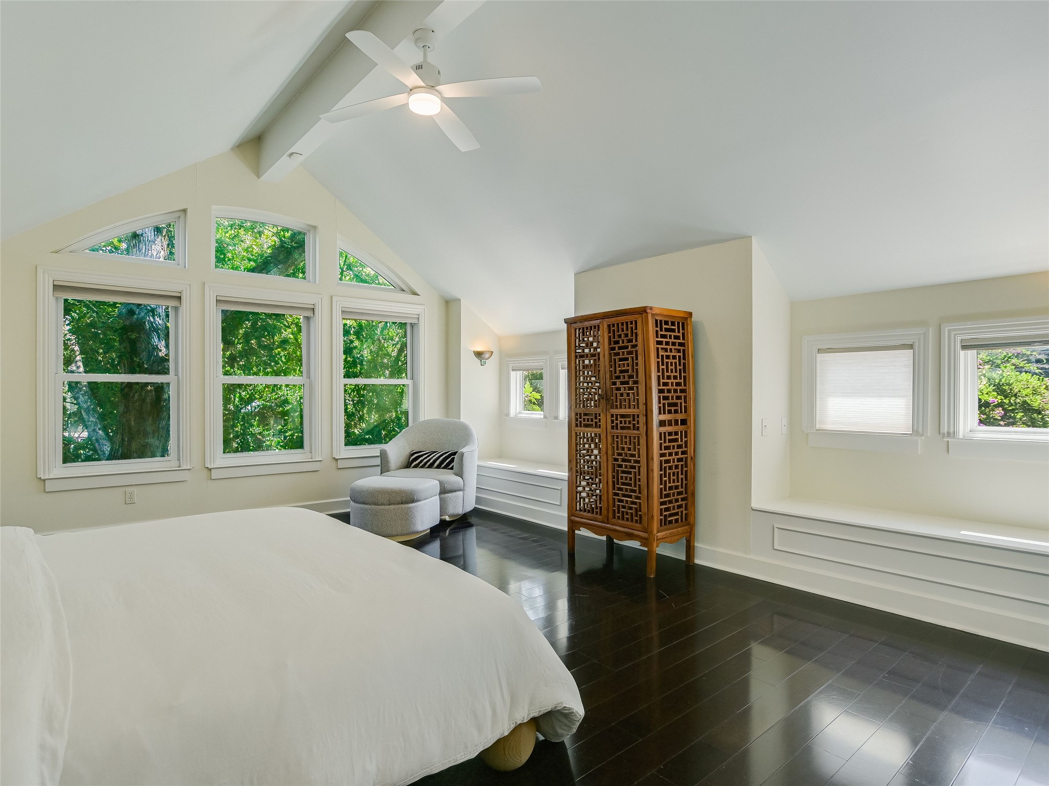 1804 Polo Road Austin, TX 78703 - Photo 6 of 19 Bedroom featuring multiple windows, ceiling fan, beamed ceiling, and dark wood-style flooring