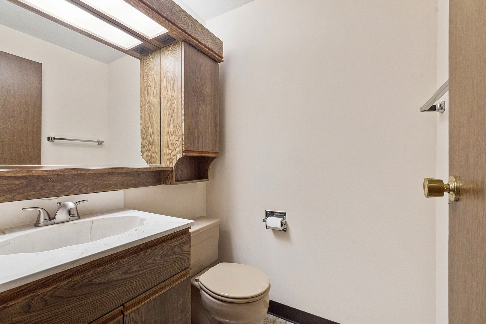 2 Vermont Circle Bolingbrook, IL 60440 - Photo 11 of 19 a bathroom with a granite countertop sink a toilet and a mirror