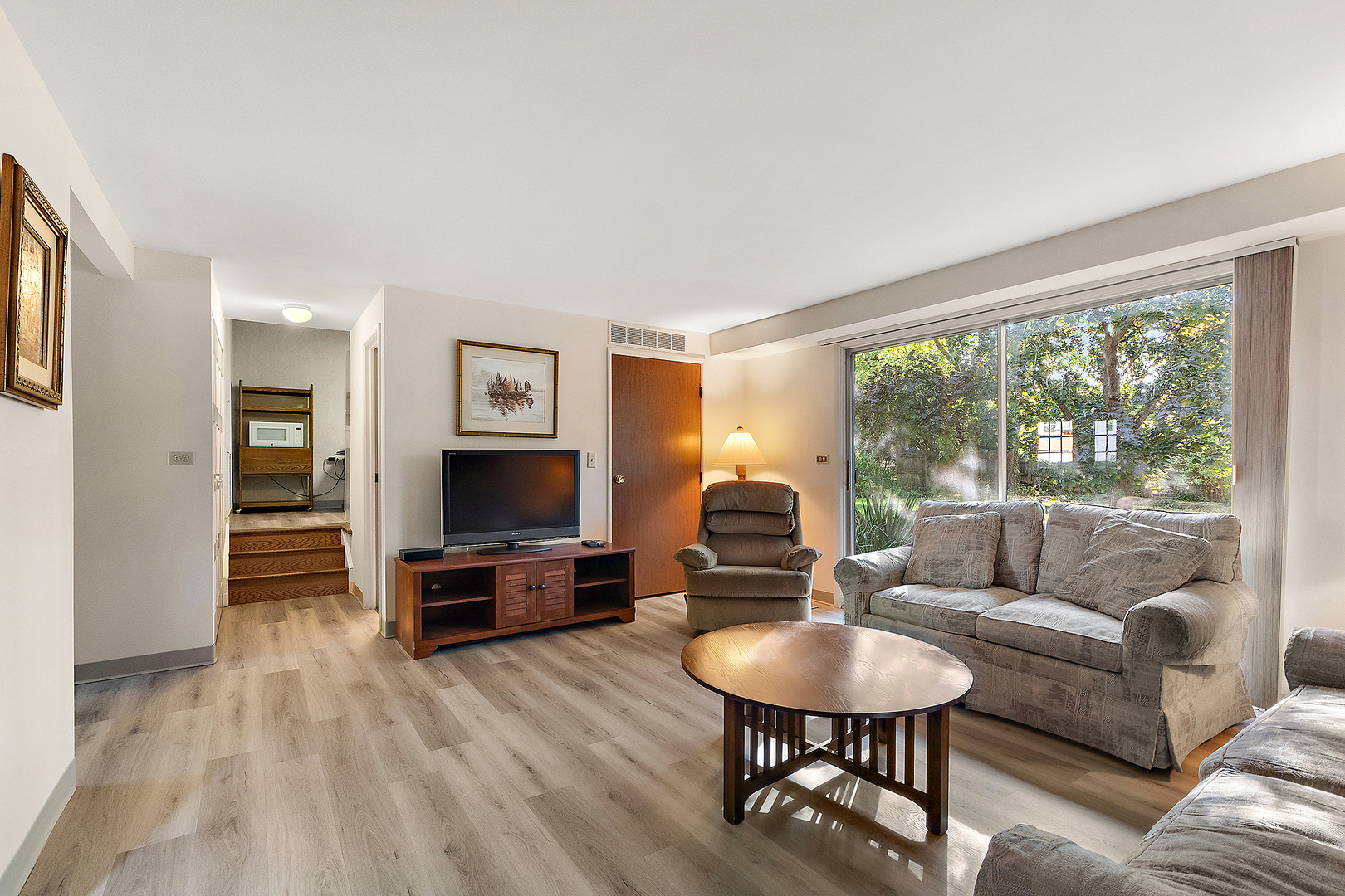 2 Vermont Circle Bolingbrook, IL 60440 - Photo 8 of 19 a living room with furniture and a flat screen tv