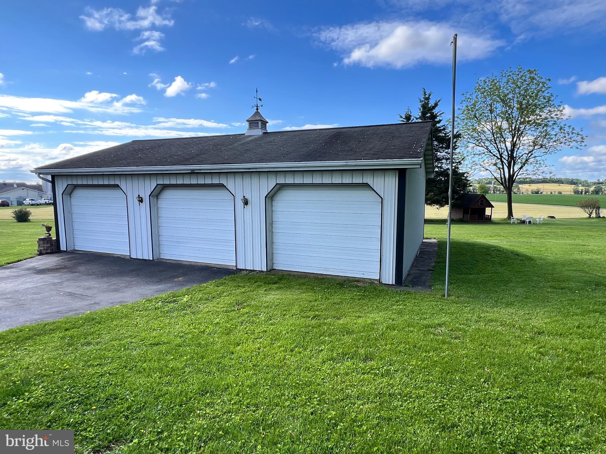 252 Doe Run Road Manheim, PA 17545 - Photo 25 of 32 a front view of a house with a yard