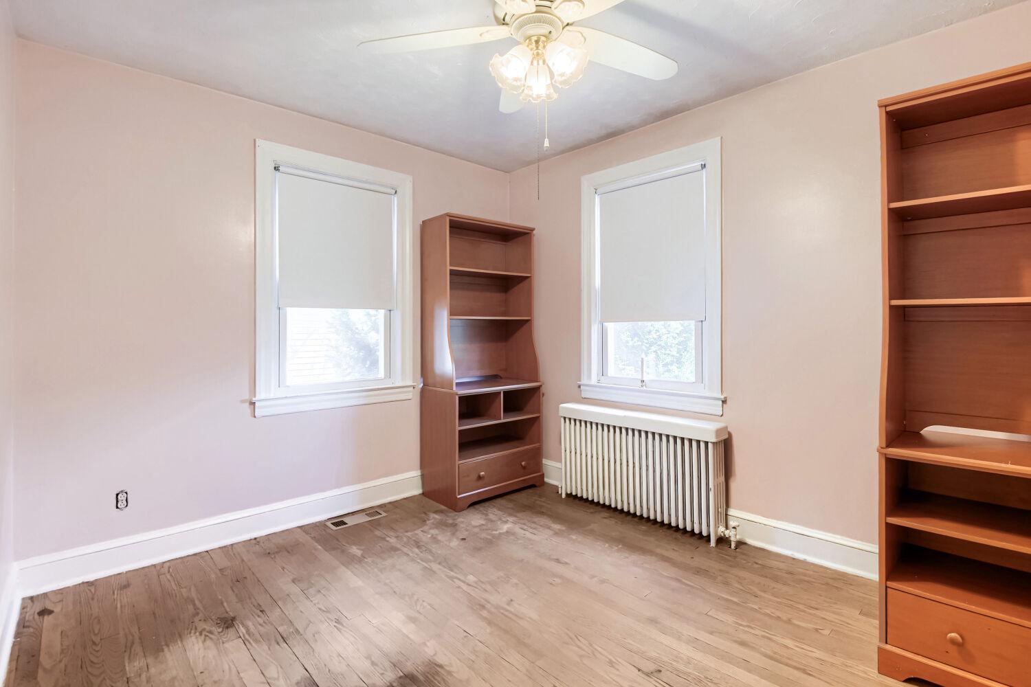 217 Doris Avenue Baltimore, MD 21225 - Photo 9 of 16 a view of an empty room with a window and closet