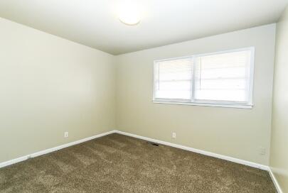 5408 31st Street Lubbock, TX 79407 - Photo 23 of 33 an empty room with a window
