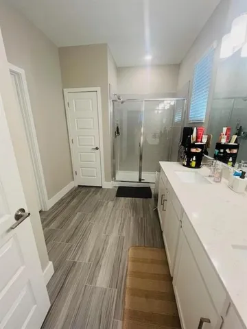 a kitchen with a sink and cabinets