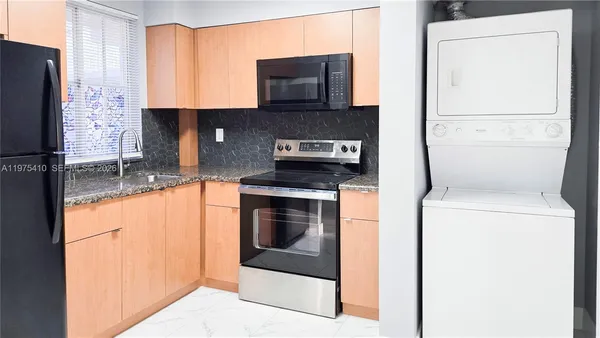 a view of a porch with furniture