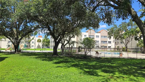 a view of staircase with white walls