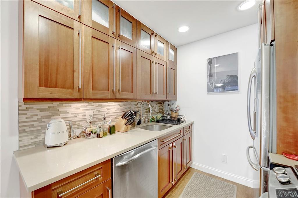 26 4th Street, Unit 2D Brooklyn, NY 11231 - Photo 12 of 26 a kitchen with a sink and cabinets