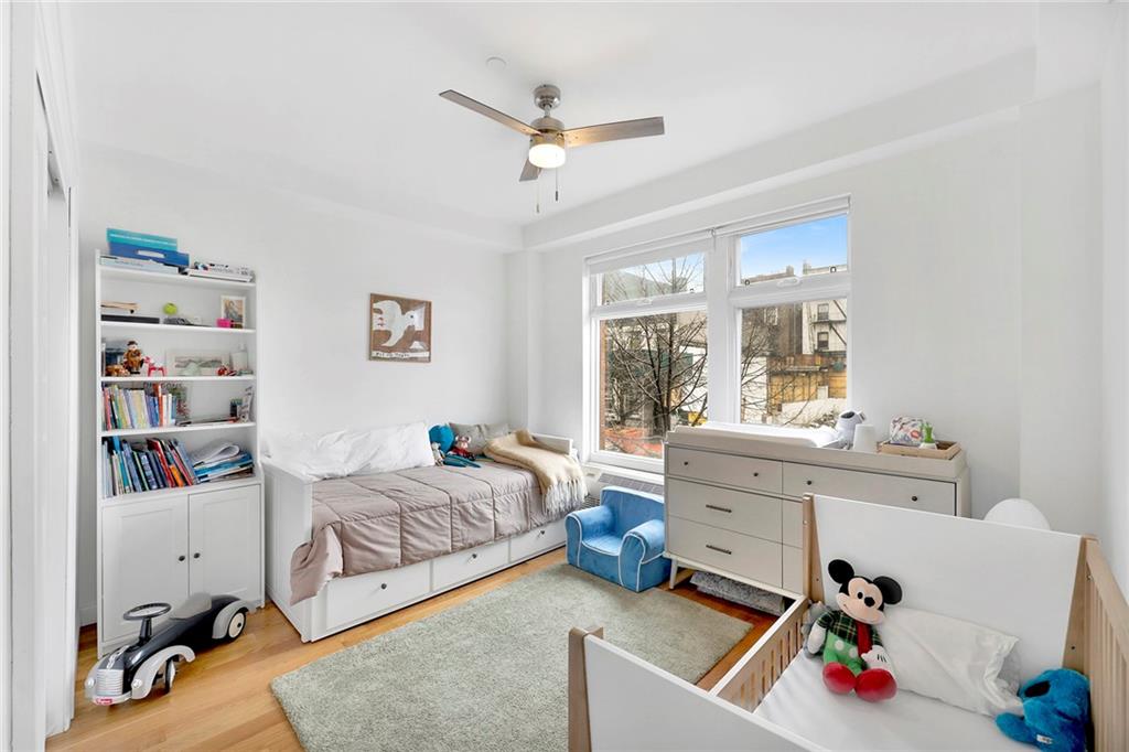 26 4th Street, Unit 2D Brooklyn, NY 11231 - Photo 19 of 26 a bed room with a bed and a window