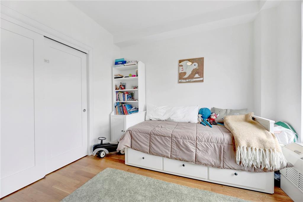 26 4th Street, Unit 2D Brooklyn, NY 11231 - Photo 20 of 26 a bedroom with a bed and a closet