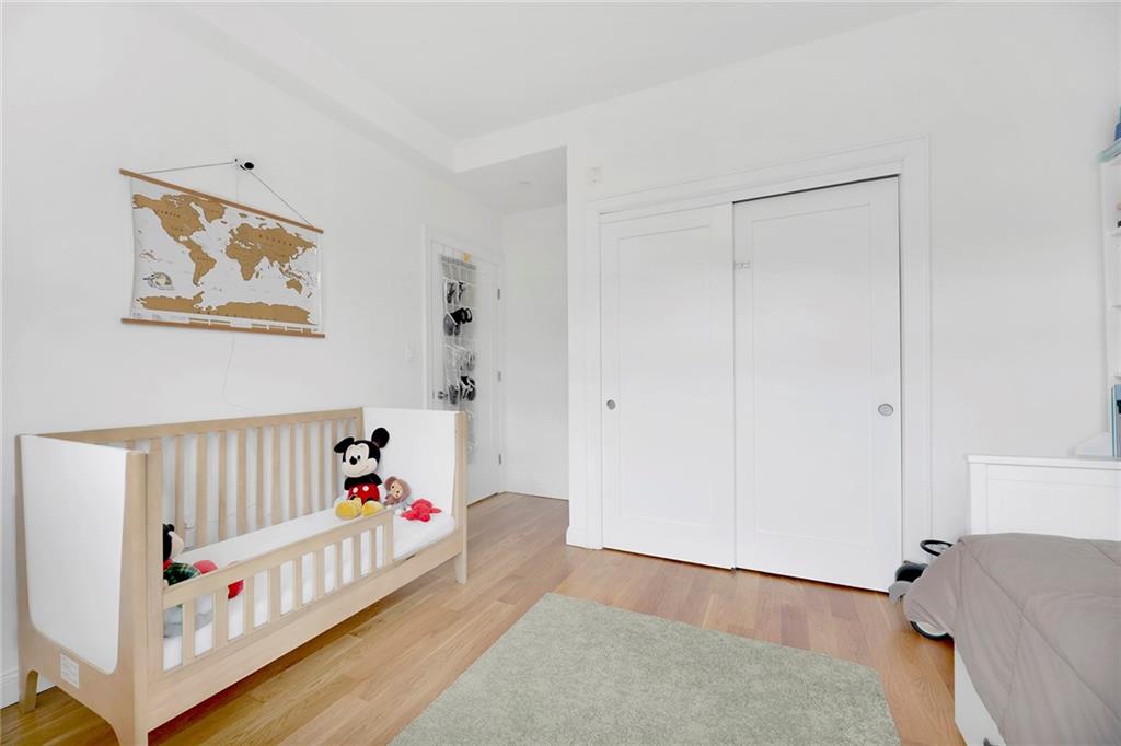 26 4th Street, Unit 2D Brooklyn, NY 11231 - Photo 21 of 26 a bathroom with a bathtub and a baby crib