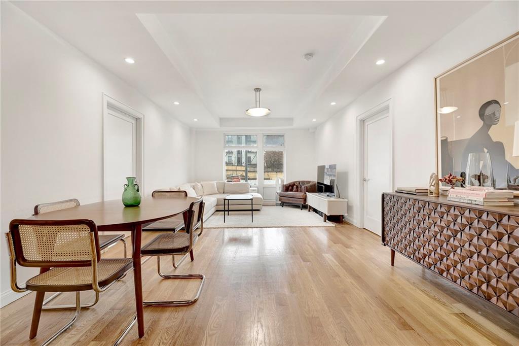26 4th Street, Unit 2D Brooklyn, NY 11231 - Photo 7 of 26 a living room with furniture and a wooden floor