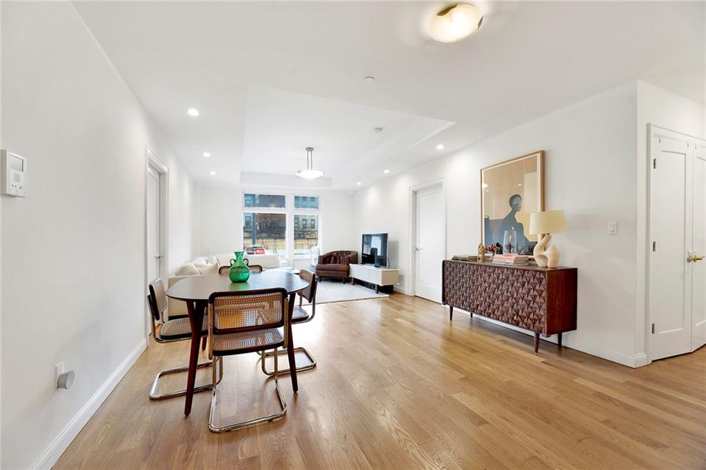 26 4th Street, Unit 2D Brooklyn, NY 11231 - Photo 8 of 26 a living room with furniture and a wooden floor
